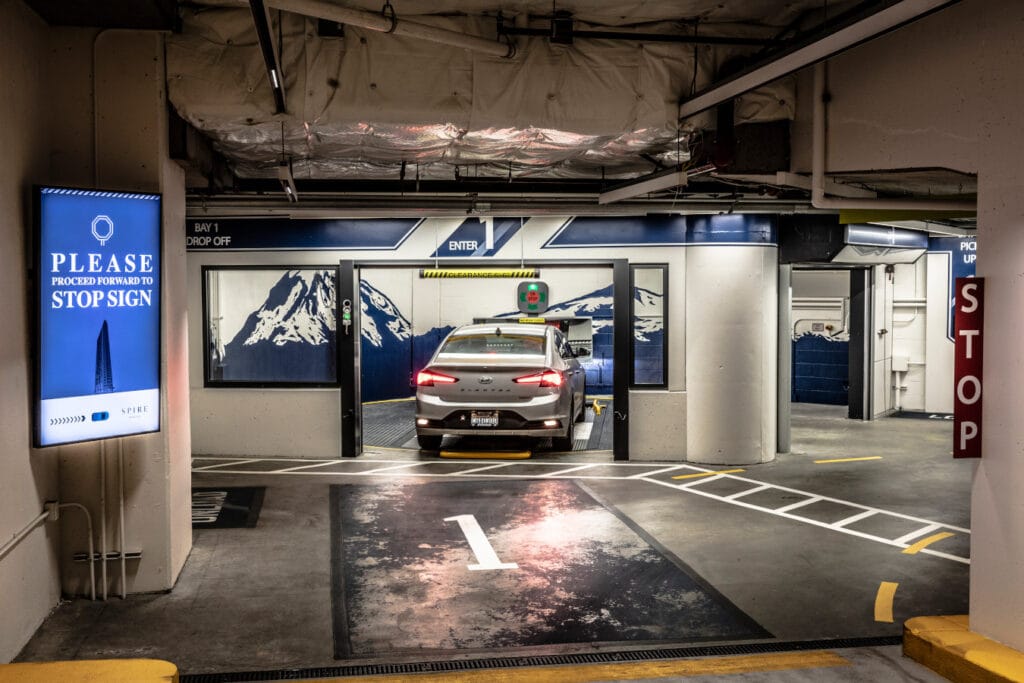 automated parking system entrance with integrated safety and control systems